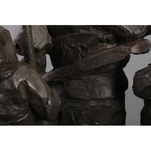 145 - A large bronze figure group depicting three oriental warriors. Indistinct signature to reverse of ce... 