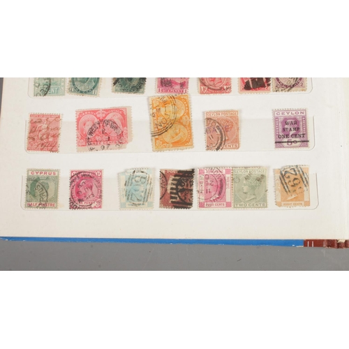 332 - A box of assorted stamps, first day covers and postcards to include Victorian Penny Red,  Royal Mail... 