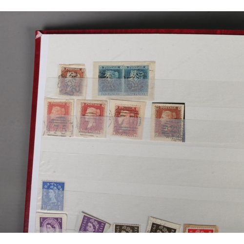 351 - A collection of partially filled stamp and first day cover albums to include five penny red stamps, ... 