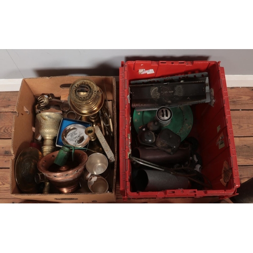 355 - Two boxes of metalwares. Includes copper kettle, oil cans, brass figures, flatware, etc.