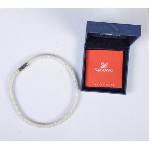 568 - A boxed Swarovski crystal choker necklace. With certificate of authenticity.