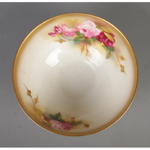 573 - A Royal Worcester blush porcelain bowl painted with rose design, signed Spilsbury. Dated approx. 192... 