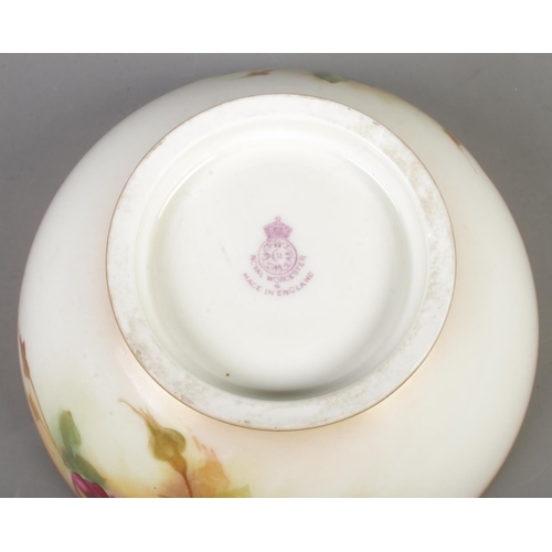 573 - A Royal Worcester blush porcelain bowl painted with rose design, signed Spilsbury. Dated approx. 192... 