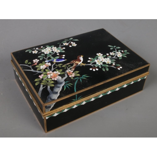 592 - A Chinese cloisonné decorated jewellery box. Decorated with birds on a branch.