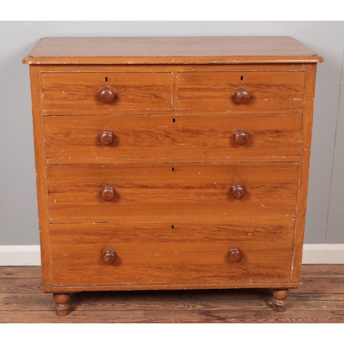 599 - A pine chest of drawers with painted finish