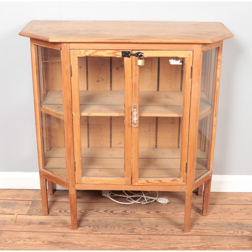 613 - A pine hexagonal shape display cabinet