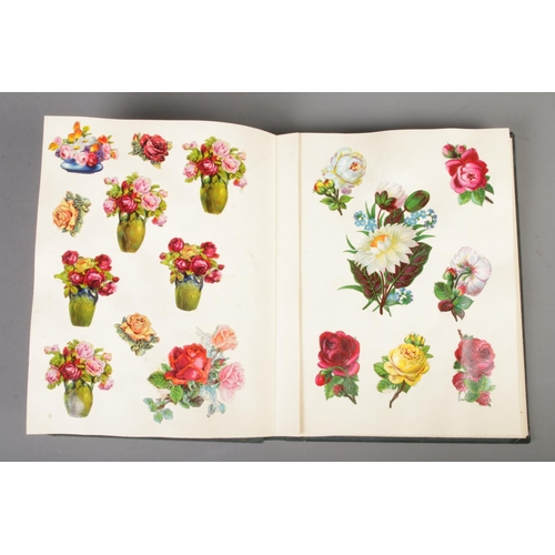 185 - A scrap book album filled with Victorian and late scraps of various themes including horses, childre... 