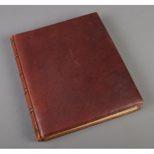 187 - A leather album of scraps with gilding finish to paper and covers fill with mostly Victorian scraps ... 