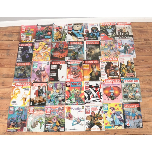 307 - A box containing a large quantity of comics and magazines. To include 2000AD, Viz, Marvel Heroes and... 