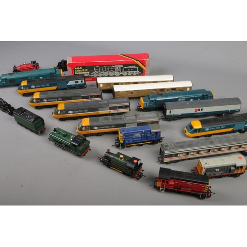 341 - A collection of Hornby Railway model trains and carriages, various designs.