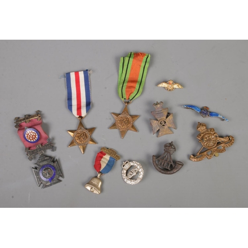 578 - A collection of mostly military medals and badges including The France and Germany Star, Kings Royal... 