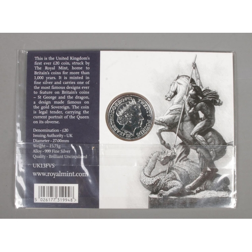 590 - The Royal Mint; Three 0.999 fine silver 2013 'A Timeless First' George and the Dragon £20 coins, in ... 