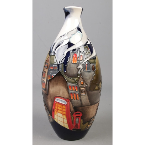 101 - A Moorcroft pottery vase decorated in the The Village pattern by Emma Bossons. Date cypher for 2013.... 