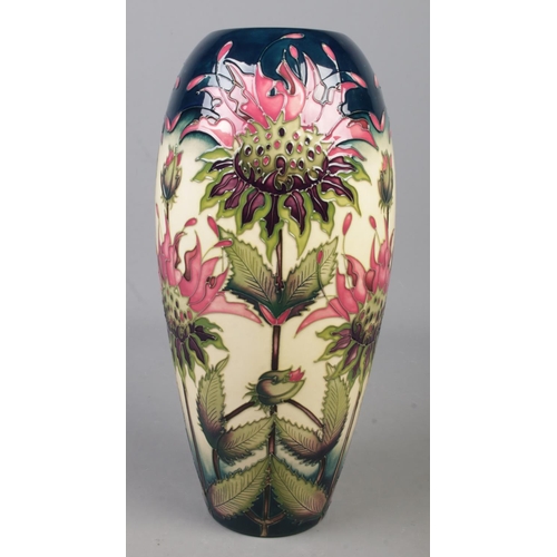 109 - A Moorcroft pottery vase decorated in the Bergamot pattern by Vicky Lovatt. Date cypher for 1999. Si... 