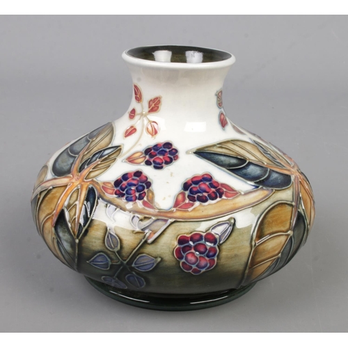 110 - A Moorcroft pottery vase decorated in the Bramble pattern by Sally Tuffin. Date cypher for 1991. Hei... 