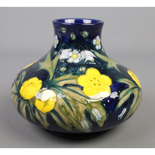 117 - A Moorcroft pottery vase decorated in the Buttercup pattern by Sally Tuffin. Date cypher for 1991. H... 