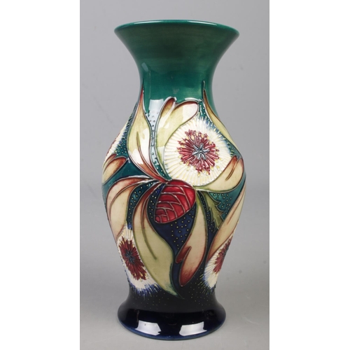 119 - A Moorcroft pottery vase decorated in the Albany pattern by Nicola Slaney. Date cypher for 2000. Hei... 