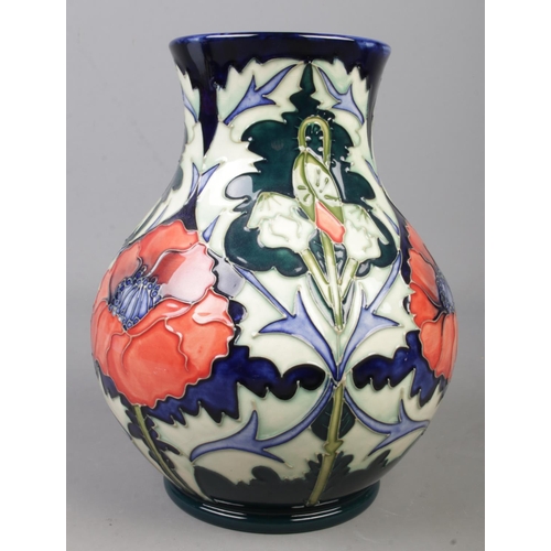 122 - A Moorcroft pottery vase decorated in the Poppy pattern by Rachel Bishop. Date cypher for 1998. Heig... 