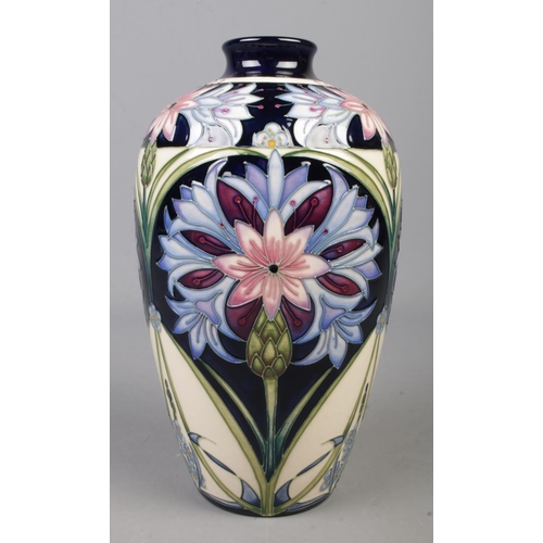 128 - A Moorcroft pottery vase decorated in the Legacy pattern by Rachel Bishop. Date cypher for 2013. Sig... 