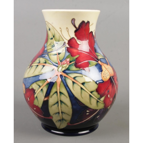 13 - A Moorcroft pottery vase decorated in the Simeon pattern by Philip Gibson. Date cypher for 2000. Sig... 