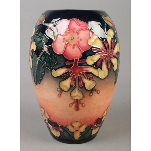 23 - A Moorcroft pottery vase decorated in the Oberon pattern by Rachel Bishop. Date cypher for 1994. Hei... 