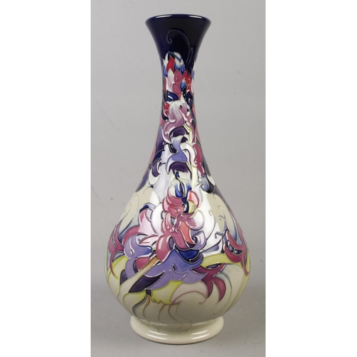 57 - A rare Moorcroft pottery vase decorated in the Hyacinth pattern by Emma Bossons. Date cypher for 201... 