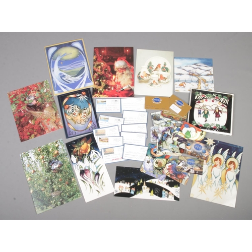 63 - A quantity of Moorcroft Christmas cards and Moorcroft Collector's Club membership cards. Includes Go... 