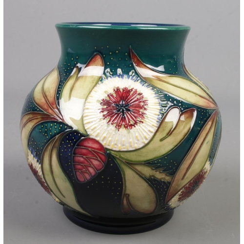 70 - A Moorcroft pottery vase decorated in the Albany pattern by Nicola Slaney. Date cypher for 2000. Hei... 