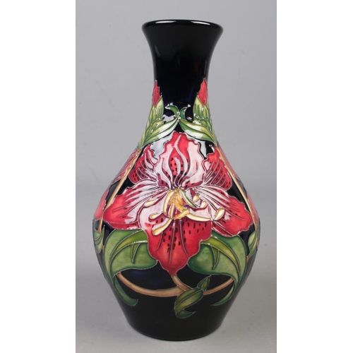 71 - A Moorcroft pottery vase decorated in the London Calling pattern by Rachel Bishop. Date cypher for 2... 