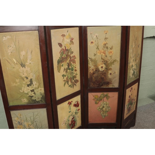 573 - An Edwardian hand painted folding screen with floral artwork.