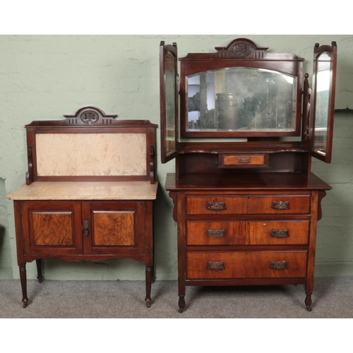 577 - A carved mahogany and walnut two piece bedroom suite. Comprising of dressing table and washstand.