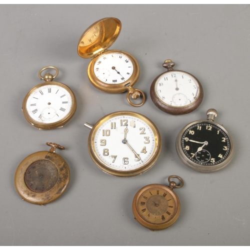 105 - Seven assorted pocket watch and travel clock movements to include full hunter cased examples.