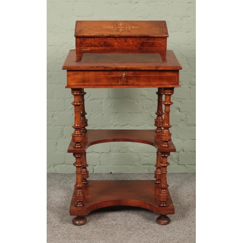 598 - A Victorian walnut Davenport desk with leather inlay writing slope.

Hx97cm
Wx53cm
Dx43cm