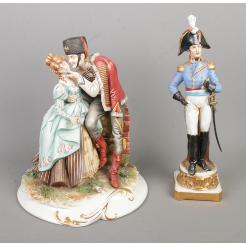 46 - Two Capodimonte ceramic figures to include limited edition 'Hussar and His Lady' along with Napoleon... 