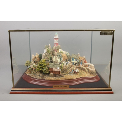 64 - A limited edition Lilliput Lane model 'Out Of The Storm', 2382/3000. Comes with original box and pap... 