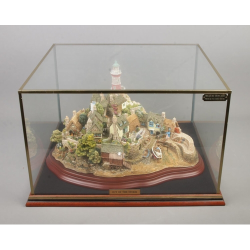 64 - A limited edition Lilliput Lane model 'Out Of The Storm', 2382/3000. Comes with original box and pap... 