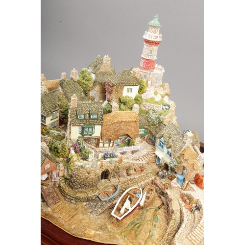 64 - A limited edition Lilliput Lane model 'Out Of The Storm', 2382/3000. Comes with original box and pap... 