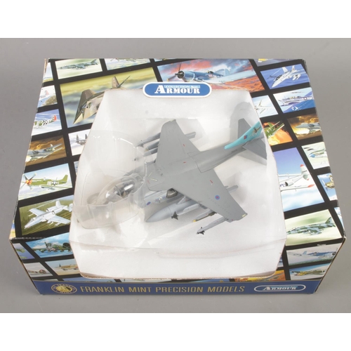 74 - A boxed Franklin Mint Precision Models Armour Collection AV8B Harrier. B11B609 1:48 scale.