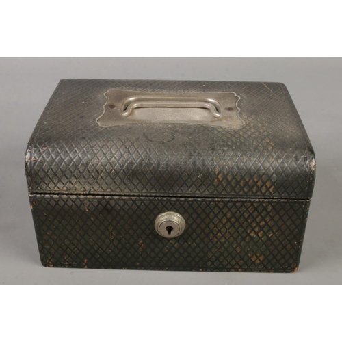 80 - A leather jewellery box with fitted interior and contents. Includes silver fob watch, vintage costum... 