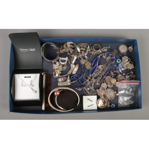 91 - A tray of silver and white metal jewellery. Includes boxed Links London silver bracelet, bangle, lap... 