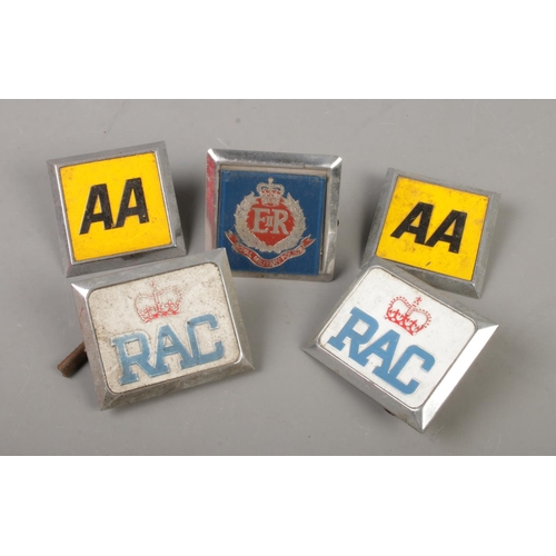 93 - Five vintage badges. Includes two AA, two RAC and a Royal Military Police example.