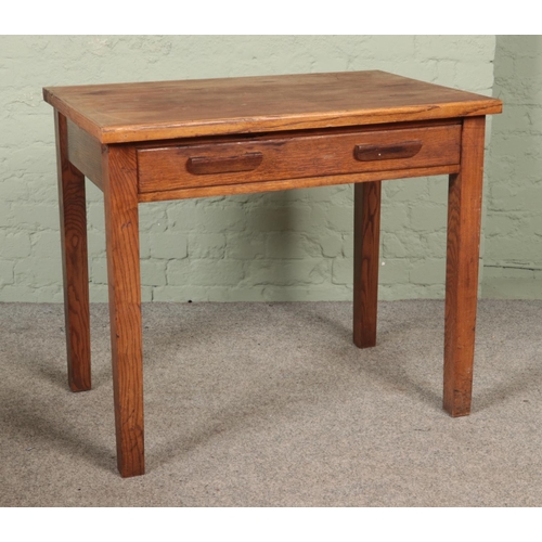 550 - A vintage oak school desk/table, with fake drawer to the front. Height: 76cm, Width: 89cm, Depth: 60... 