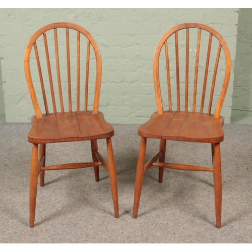 553 - A collection of chairs and stools, to include two vintage Ercol dining chairs, model 290 and a paint... 