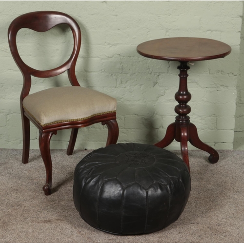 561 - A stitched leather footstool together with mahogany wine table and bolt back chair.