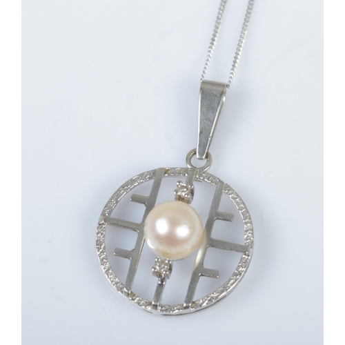 497 - A 14ct white gold pearl & diamond pendant on 9ct gold trace chain. 3.7g.