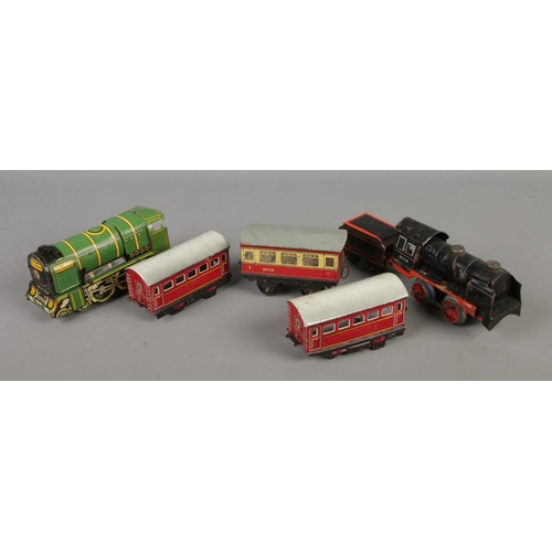 97 - A small quantity of OO gauge tin plate model railway trains. Karl Bub including locomotive and tende... 