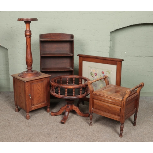 598 - Six assorted pieces of furniture. Includes open bookcase, fire screen, pine plant stand, tray on sta... 