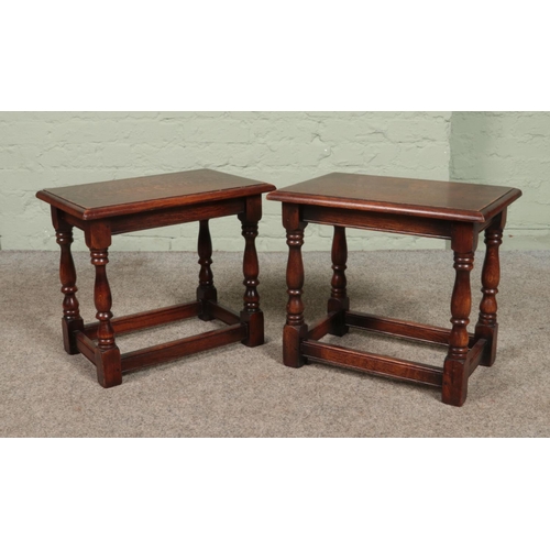 609 - A pair of small oak occasional tables with turned supports.