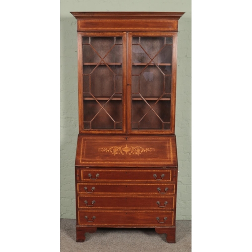 612 - An Edwardian mahogany bureau bookcase. With satinwood inlay and crossbanding. Height 208.5cm, Width ... 