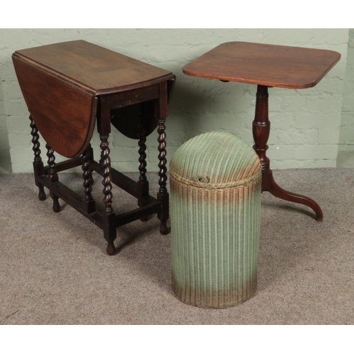 613 - Three pieces of furniture. Includes oak drop leaf table, mahogany snap top side table and a Lloyd Lo... 